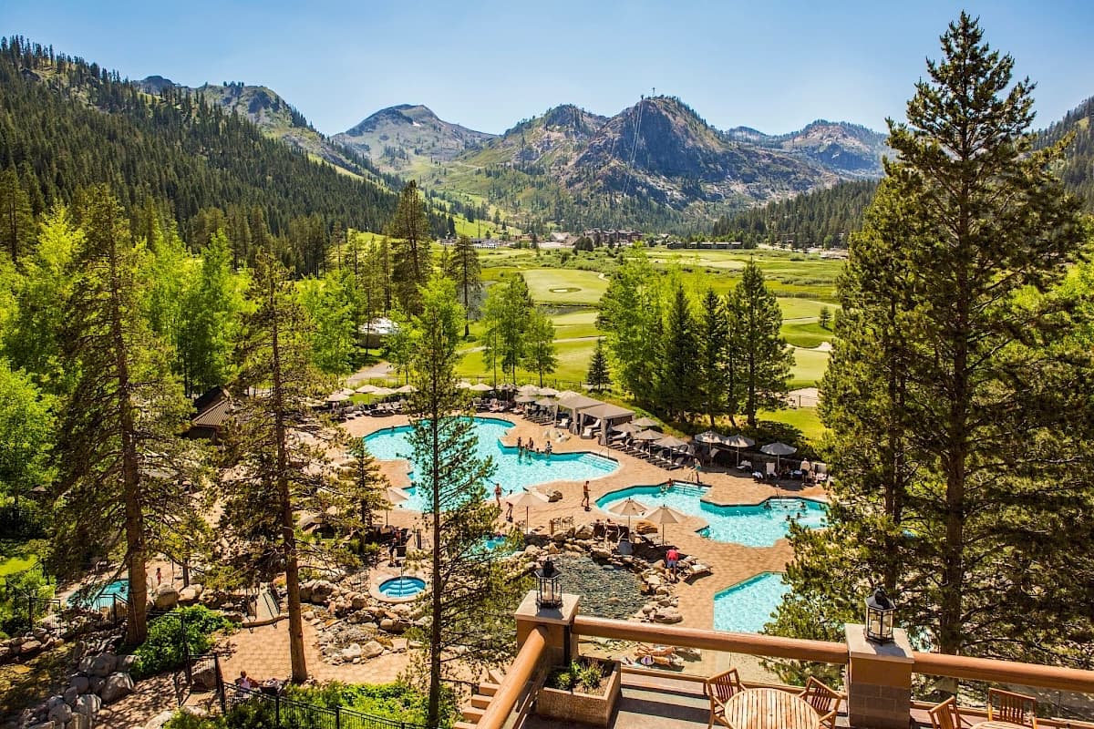 Everline Resort pool and Olympic Valley in summer