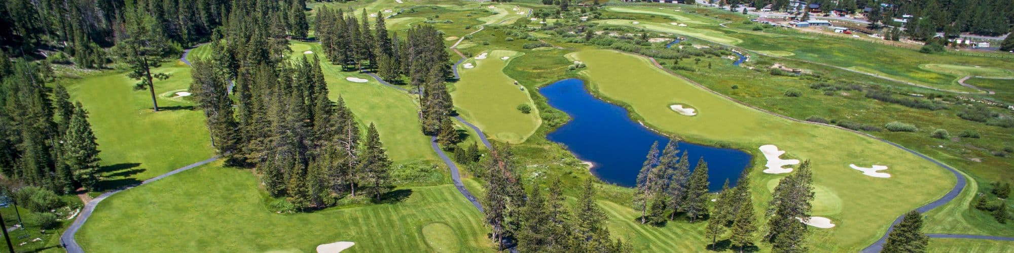 An 18-hole Robert Trent Jones Jr. championship course at the base of Palisades Tahoe